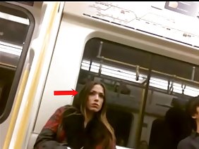Lesbian with red dildo.